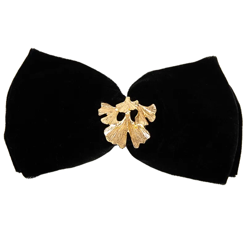 Oversize velvet bow with a golden leaf