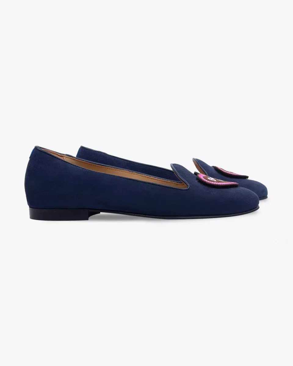 Navy blue suede slippers with a heart patch reading "Bussi" (kiss in German)