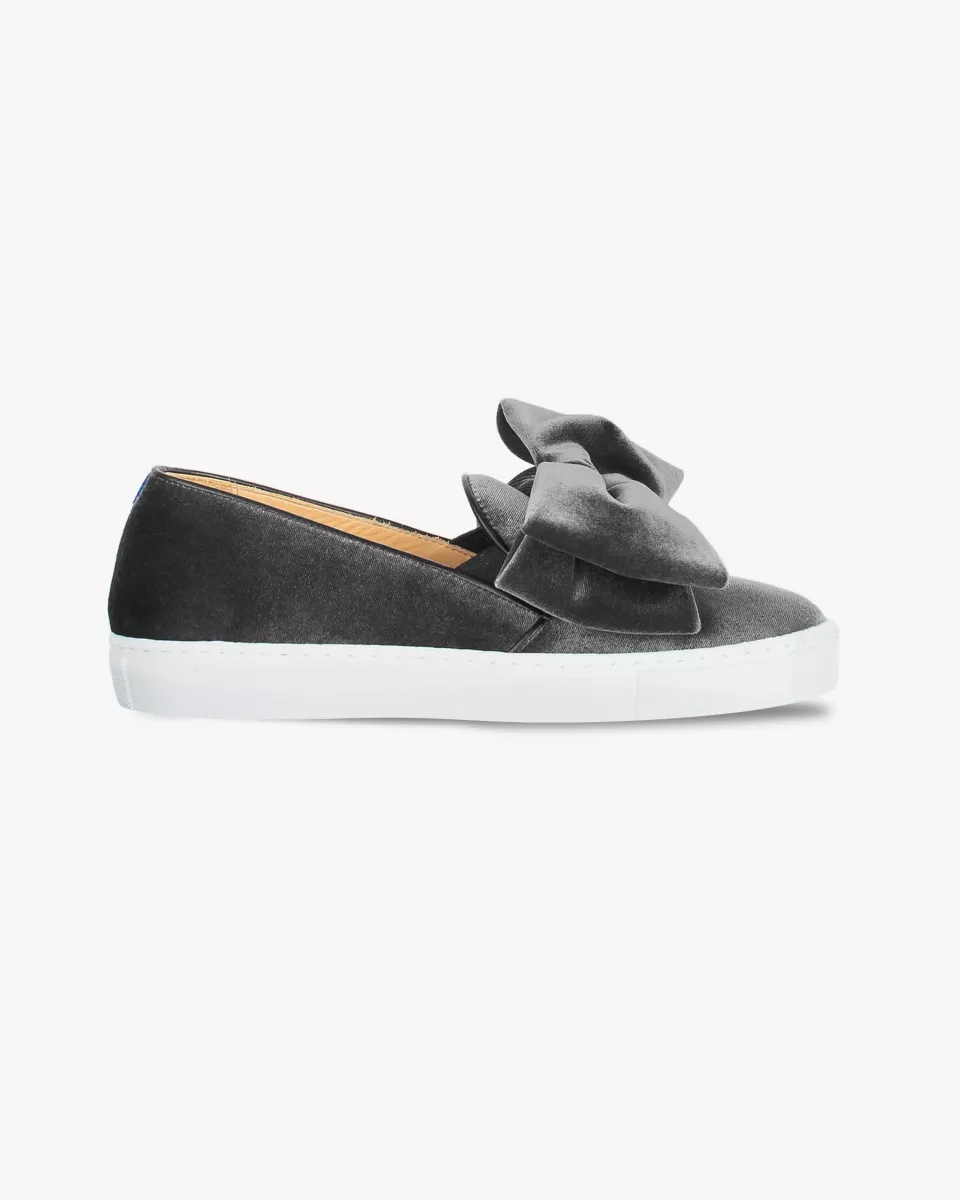 Grey velvet slip-ons with oversize bow