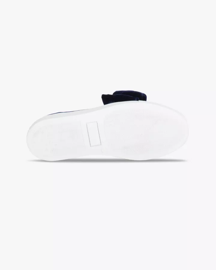 Navy blue velvet slip-ons with oversized bow