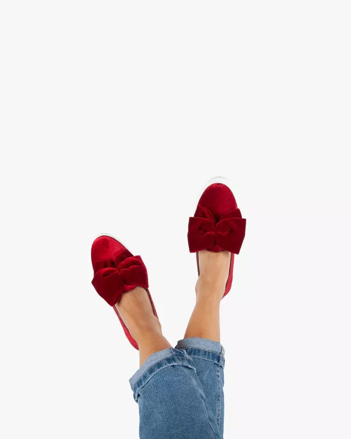 Red velvet slip-ons with oversized bow
