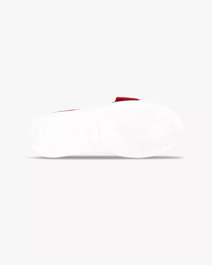 Red velvet slip-ons with oversized bow