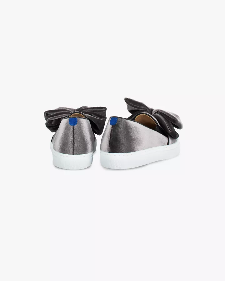 Grey velvet slip-ons with oversize bow