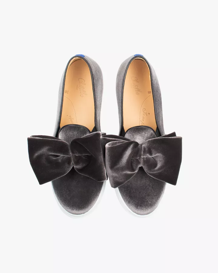 Grey velvet slip-ons with oversize bow