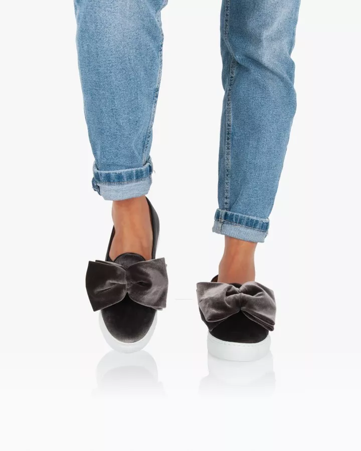 Grey velvet slip-ons with oversize bow