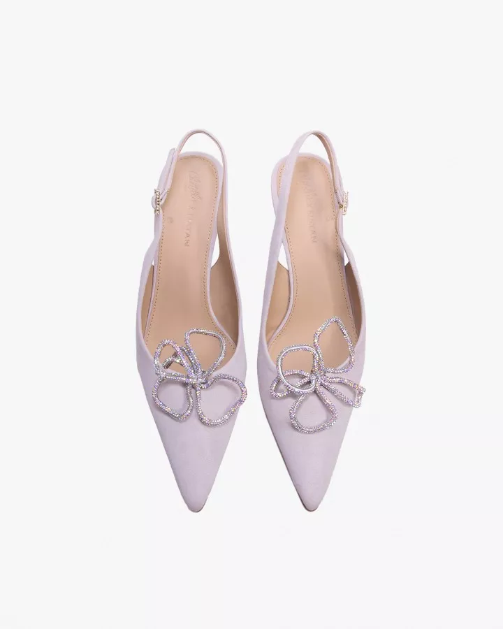 Pale Pink suede stilettos adorned by Inés de Cominges, including one pair of jewel accessories of your choice.