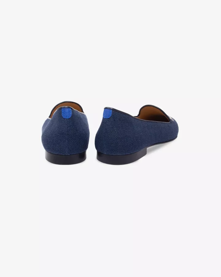Navy suede slippers embroidered with a white & light gold feather