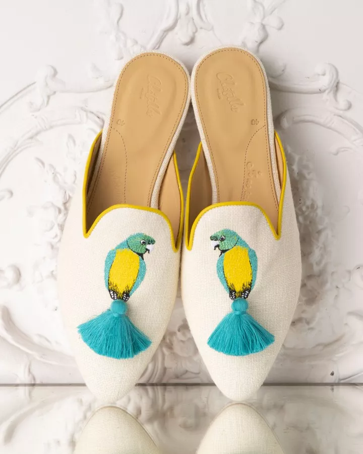 Beige canvas mules with blue and yellow embroideries